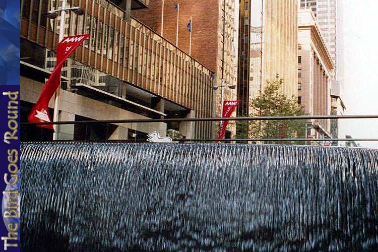 Another fountain, this time in Sydney's financial district. Why they want a fountain, I couldn't tell you, but there you go. And, indeed, there goes the bird!